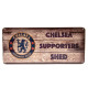 Sign Featuring Classic Chelsea FC Colors and Typography